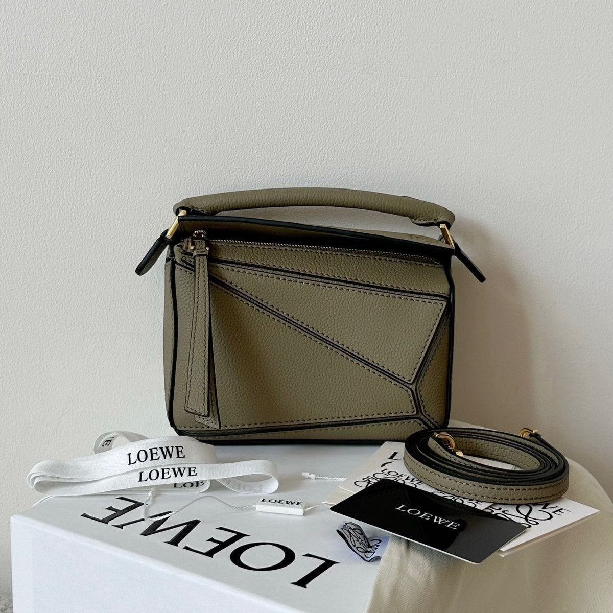 Wallets? Loew Mini Puzzle Edge Bag Elegant Everyday Leather Wallet