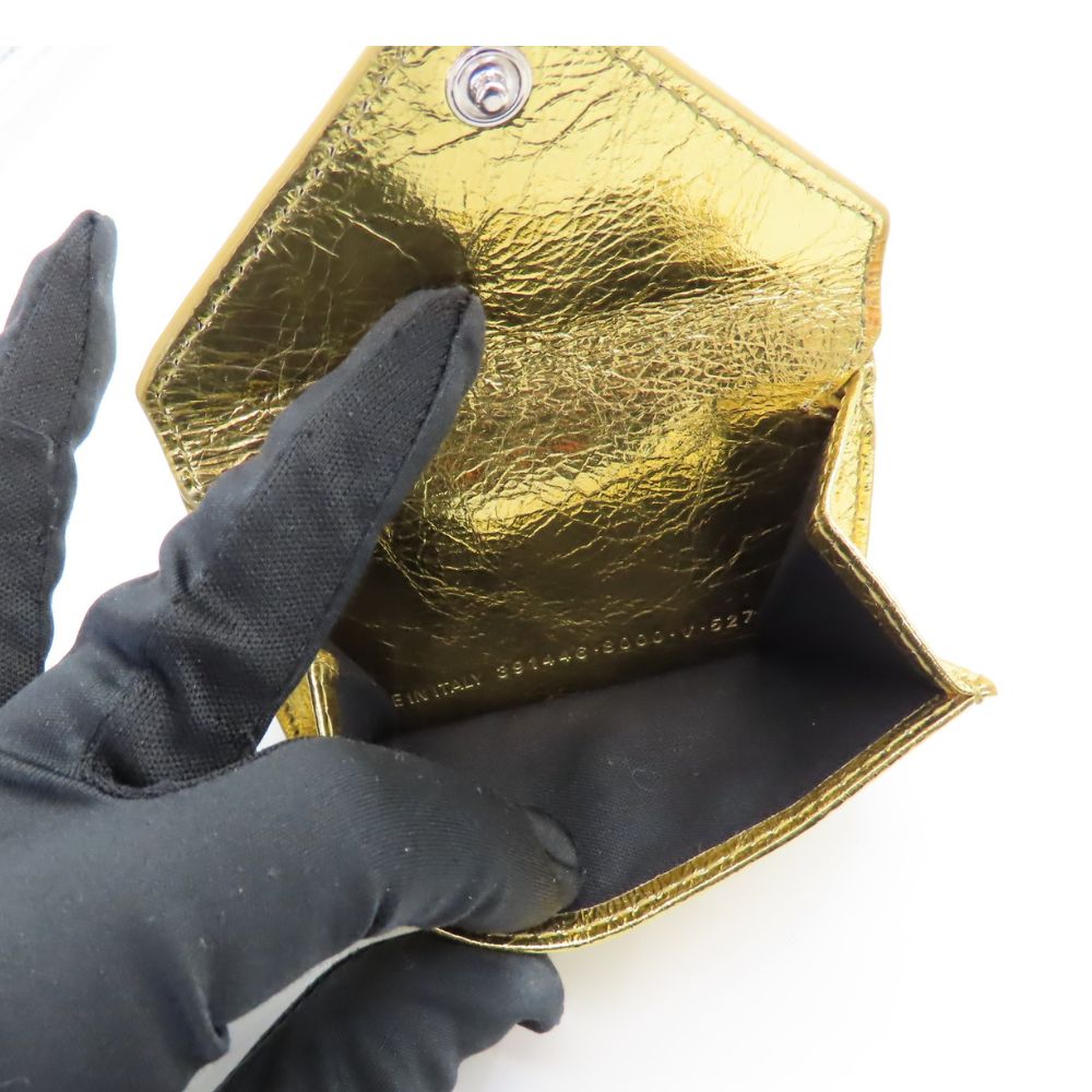Side view of Balenciaga wallet Gold premium designer bag