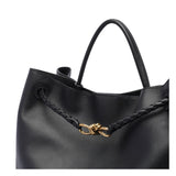 Close-up of Bottega Veneta totes hardware and fine stitching