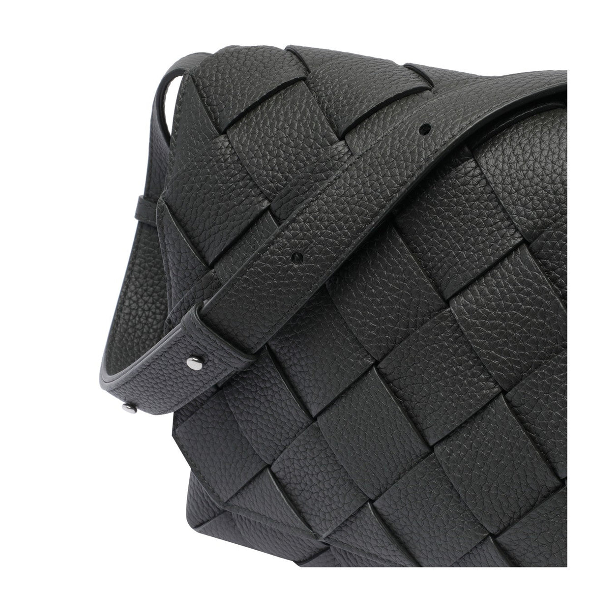 Close-up of Bottega Veneta cross body bags hardware and fine stitching
