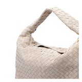 Close-up of Bottega Veneta shoulder bags hardware and fine stitching