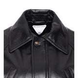 Close-up of Bottega Veneta coats hardware and fine stitching