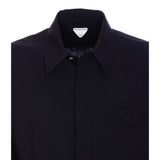 Close-up of Bottega Veneta blouses hardware and fine stitching