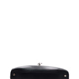 Close-up of Cassandre bags hardware and fine stitching