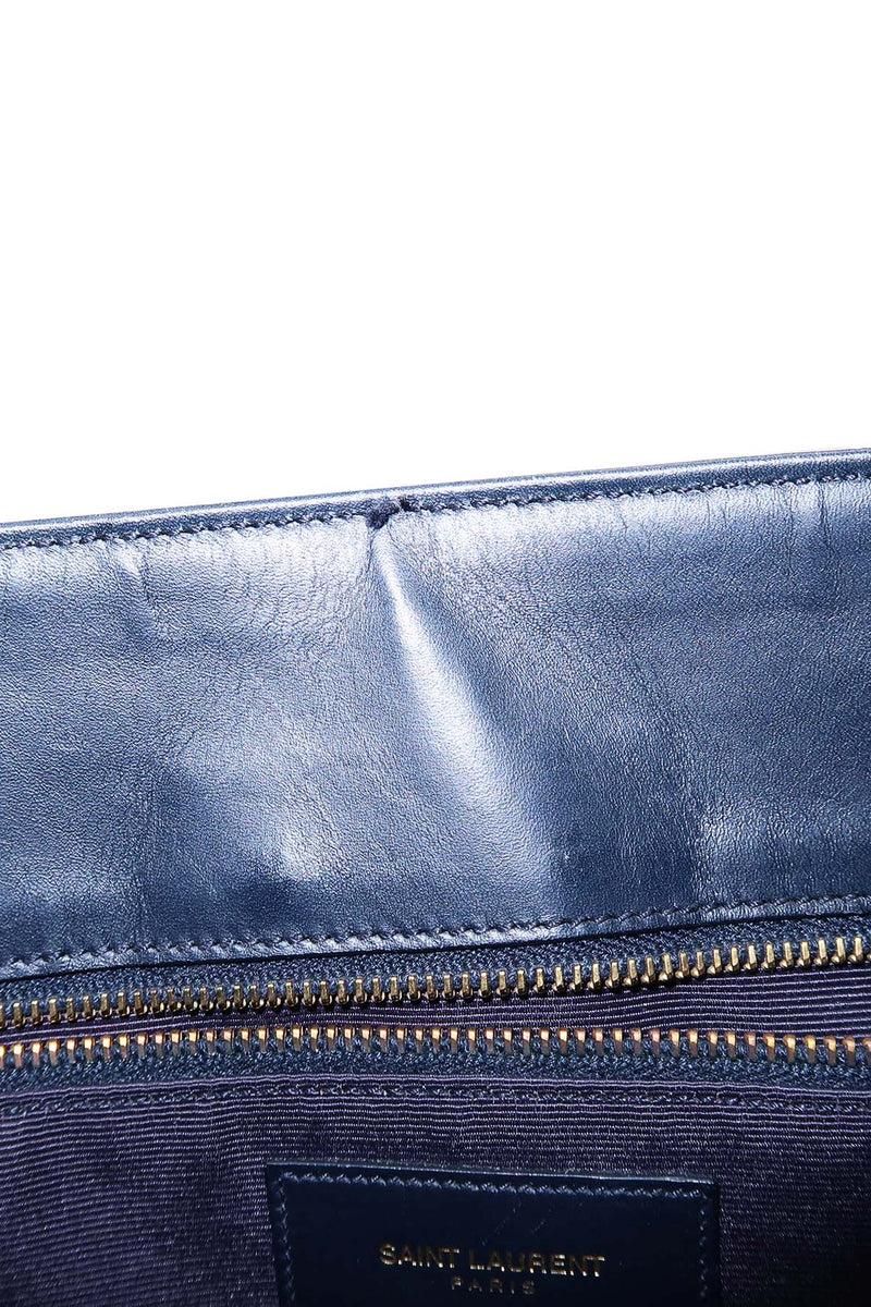 Close-up of Cassandre bags hardware and fine stitching