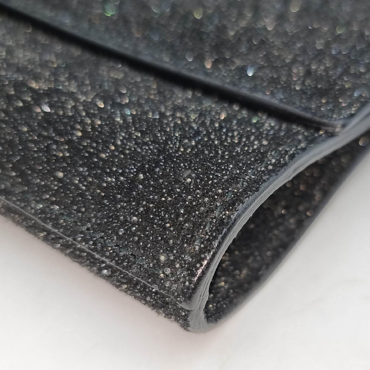 Close-up of Chyc bags hardware and fine stitching