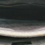 Close-up of Classic bags hardware and fine stitching