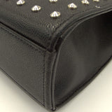 Close-up of Large bags hardware and fine stitching