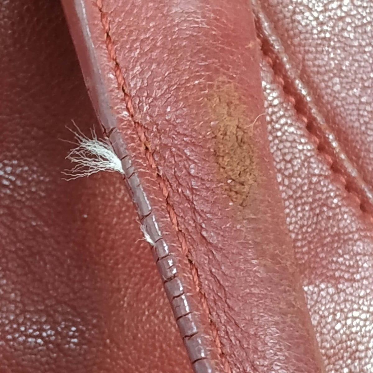 Close-up of Medium bags hardware and fine stitching