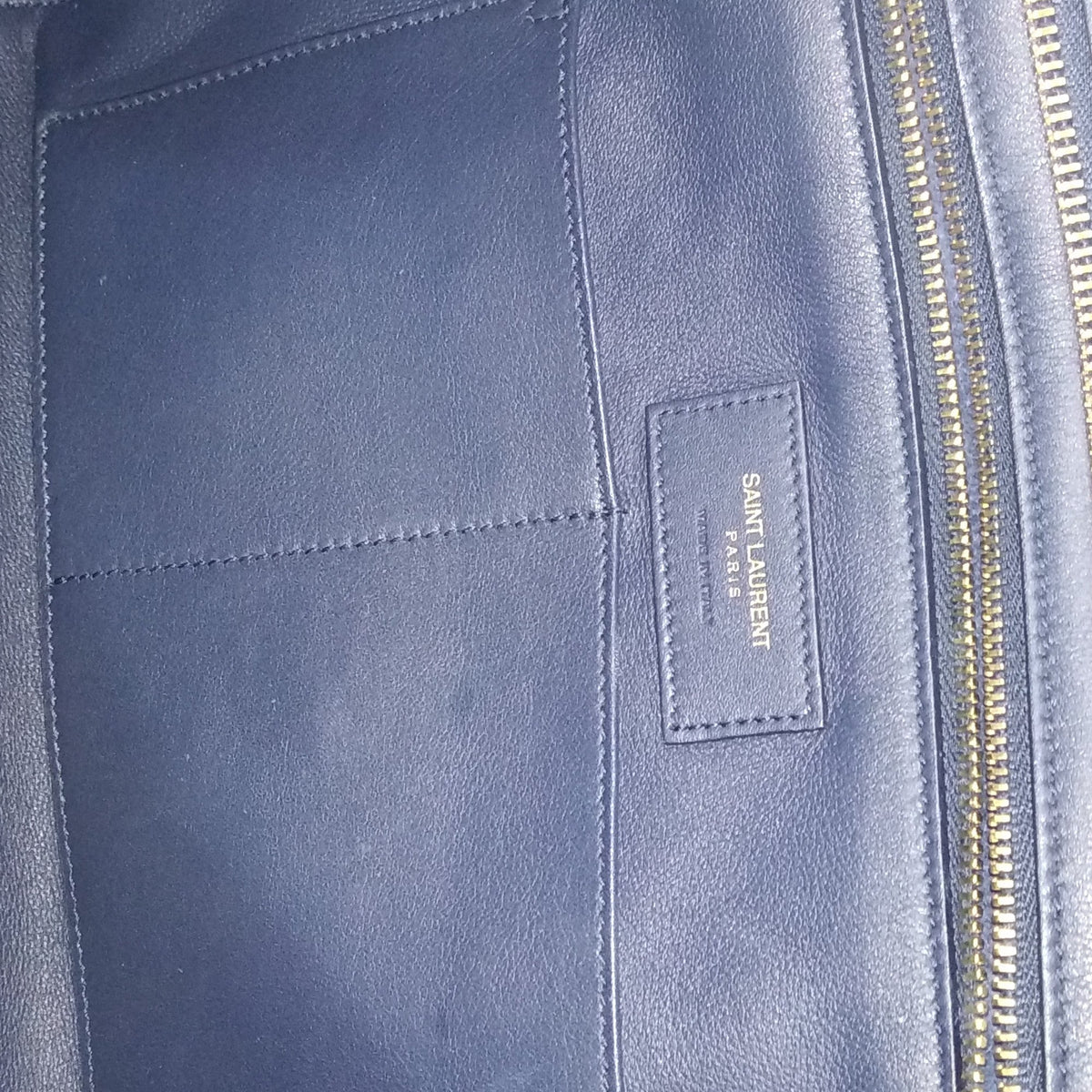 Close-up of Medium bags hardware and fine stitching