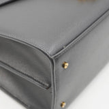 Close-up of Medium bags hardware and fine stitching