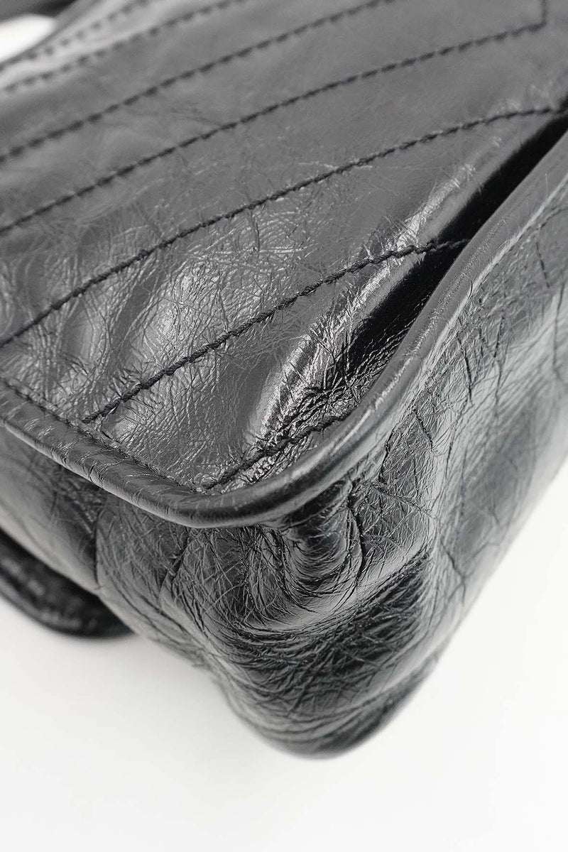 Close-up of Medium bags hardware and fine stitching