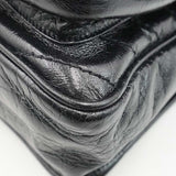 Close-up of Medium bags hardware and fine stitching