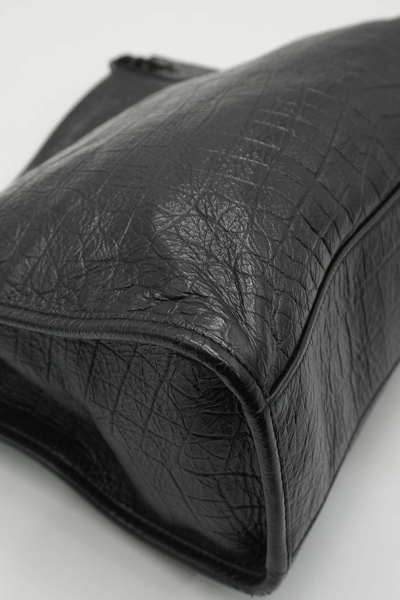 Close-up of Medium bags hardware and fine stitching