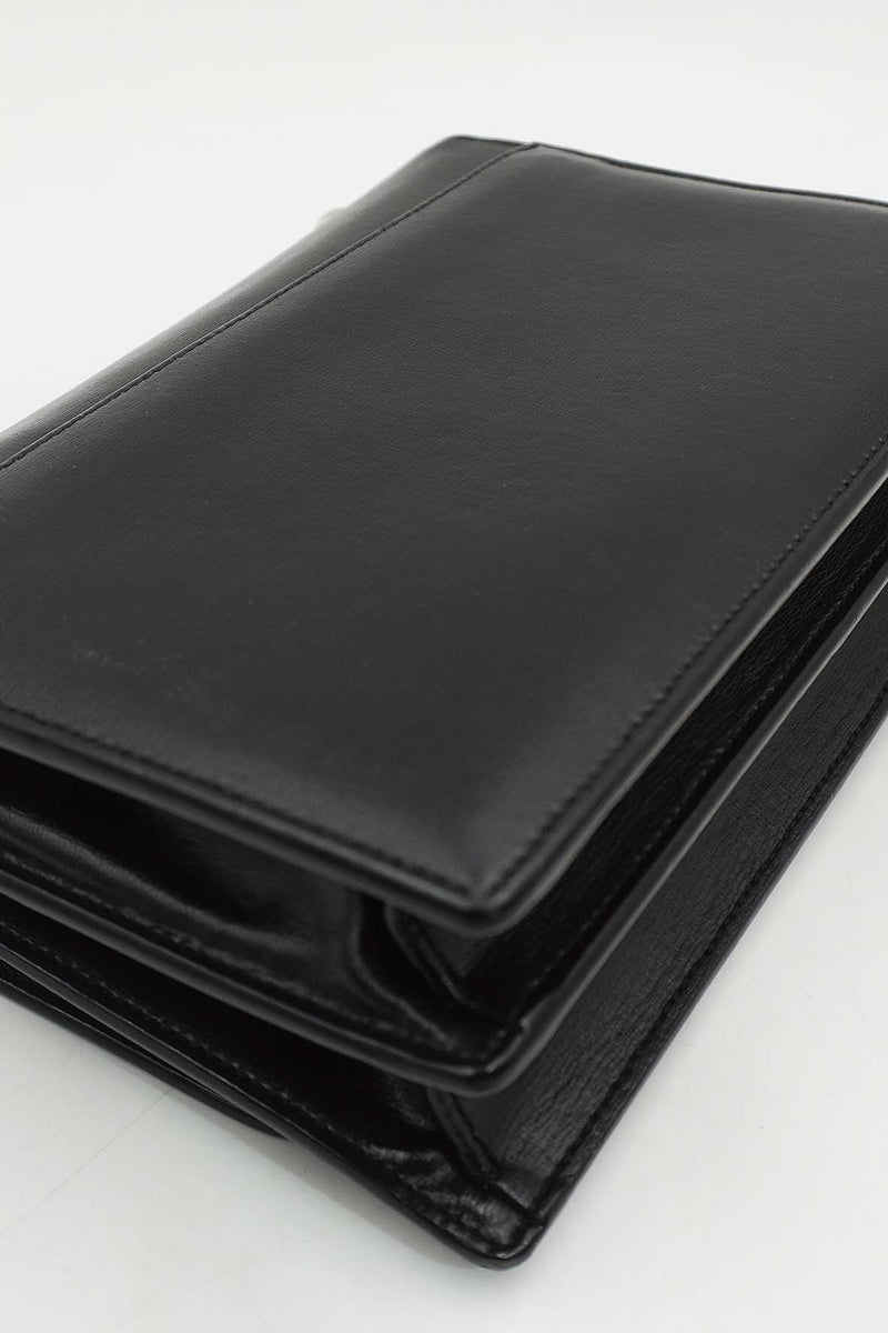 Close-up of Medium bags hardware and fine stitching