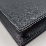 Close-up of Monogram bags hardware and fine stitching