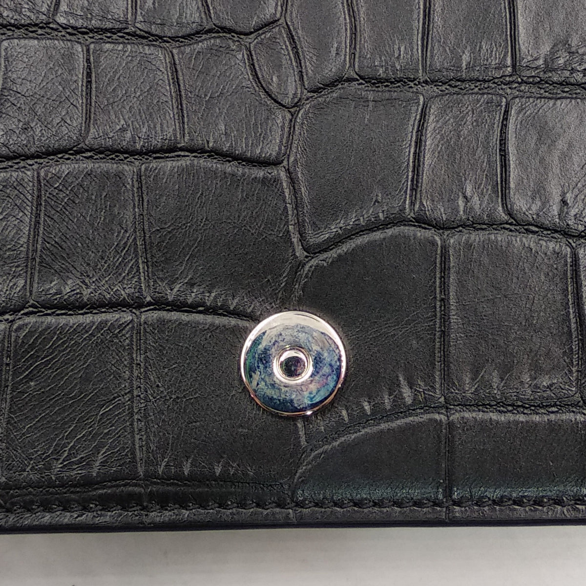 Monogram premium bags detail and craftsmanship close-up