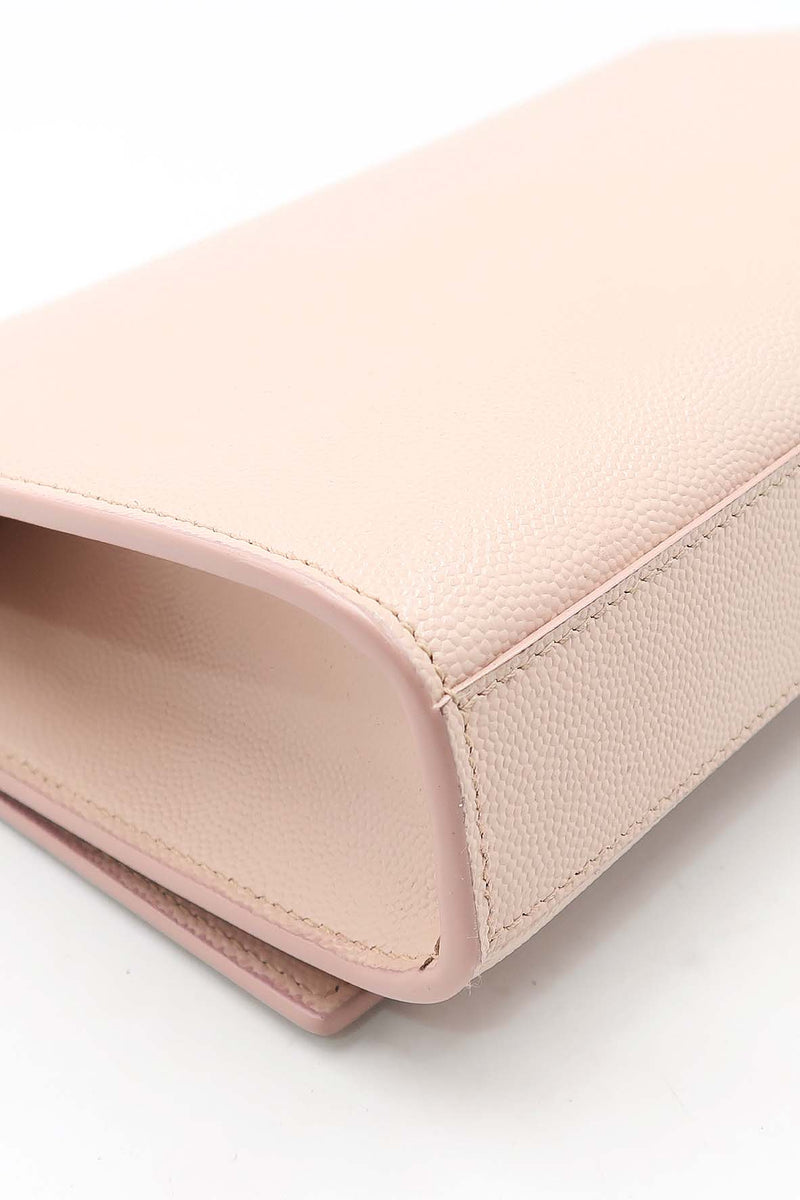Close-up of Monogram bags hardware and fine stitching