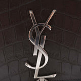 Close-up of Monogram bags hardware and fine stitching