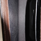 Close-up of Monogram bags hardware and fine stitching