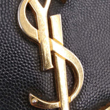 Close-up of Monogram bags hardware and fine stitching