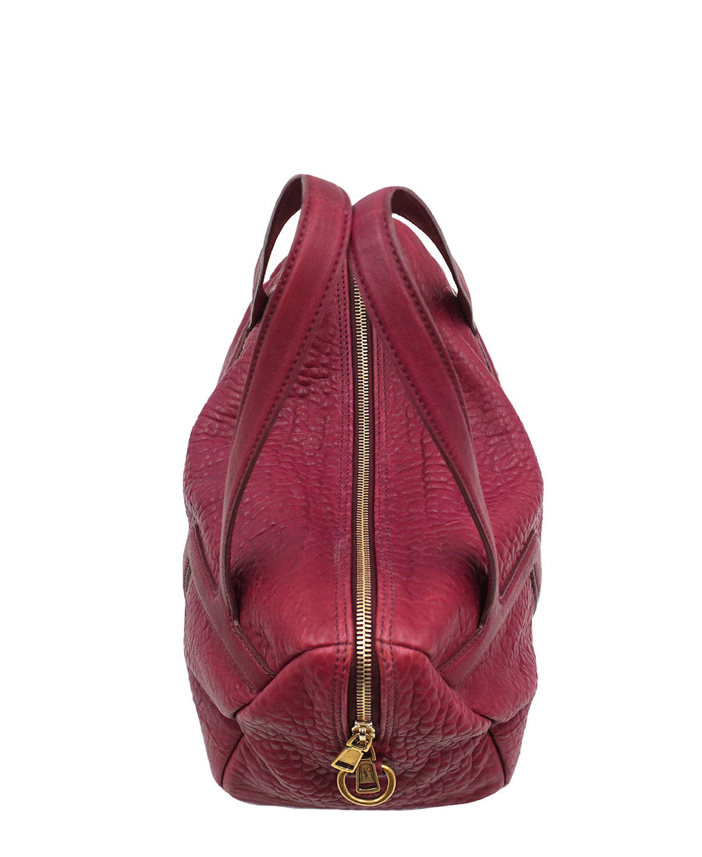 Pebbled bags side profile designer luxury fashion