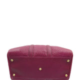 Close-up of Pebbled bags hardware and fine stitching