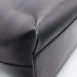 Close-up of Perforated bags hardware and fine stitching