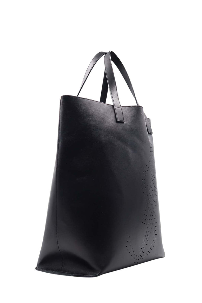 Close-up of Perforated bags hardware and fine stitching