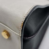 Close-up of Classic bags hardware and fine stitching