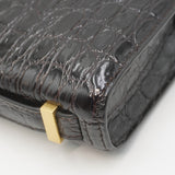 Close-up of Croco bags hardware and fine stitching