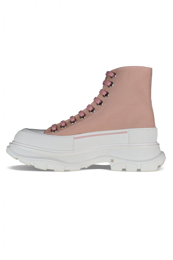 Close-up of Alexander McQueen athletic hardware and fine stitching