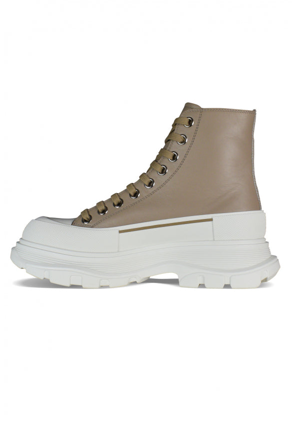 Close-up of Alexander McQueen athletic hardware and fine stitching