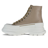 Close-up of Alexander McQueen athletic hardware and fine stitching