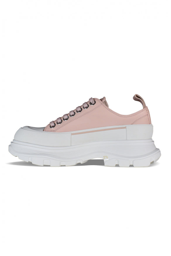 Close-up of Alexander McQueen athletic hardware and fine stitching