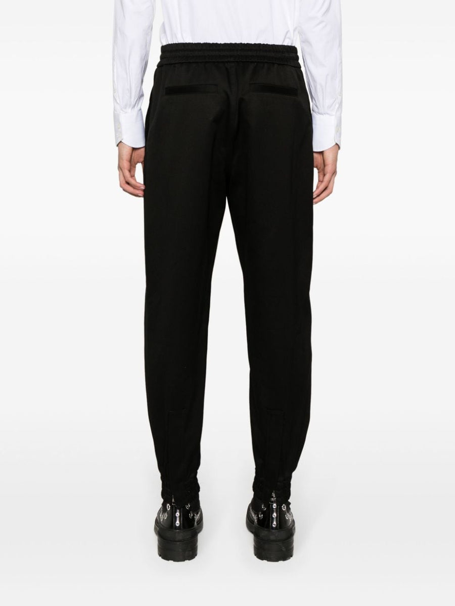 Alexander McQueen premium pants detail and craftsmanship close-up