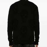 Close-up of Alexander McQueen sweaters & pullovers hardware and fine stitching