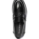 Close-up of Alexander McQueen slides hardware and fine stitching