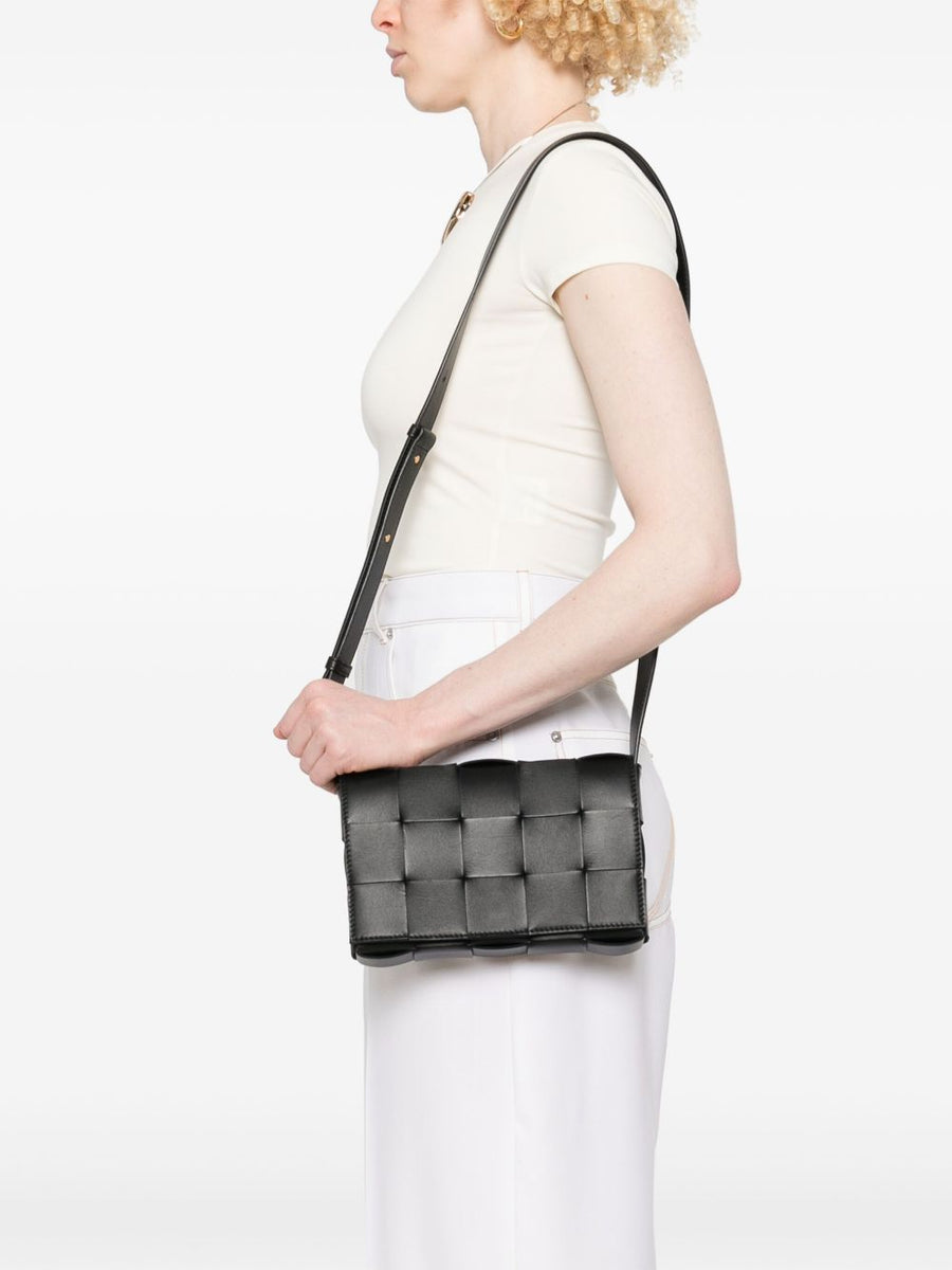 Close-up of Bottega Veneta shoulder bags hardware and fine stitching