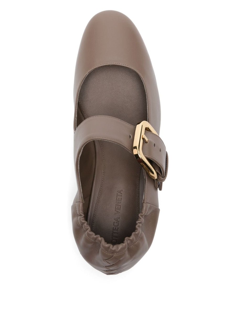 Close-up of Bottega Veneta flats hardware and fine stitching