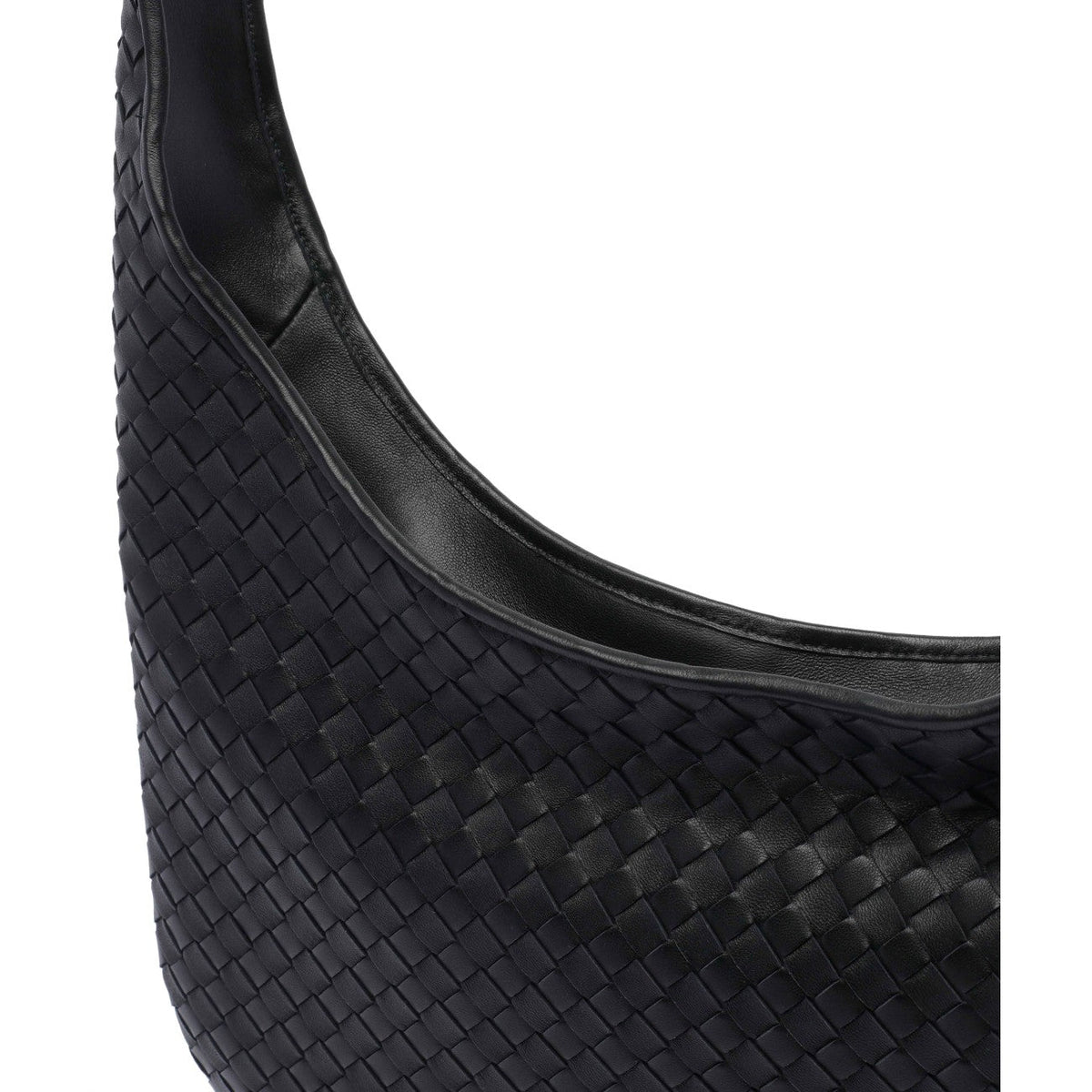 Close-up of Bottega Veneta cross body bags hardware and fine stitching